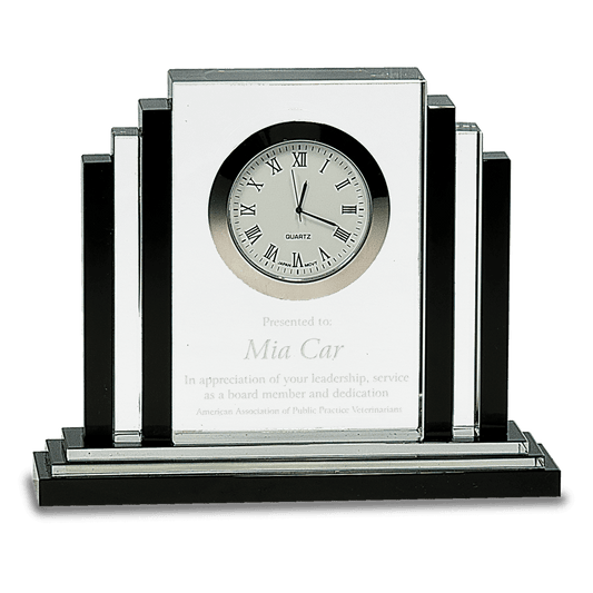 Crystal award containing a clock in the middle